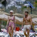 Vogue Williams – Spotted in a pink bikini on the Ibiza beach - 454 x 559