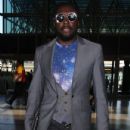 Will I Am arrived at the LAX Airport in Los Angeles, California on July 10, 2012 to catch a flight out of town - 432 x 594