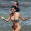 Malu Trevejo – In a gold bikini during a beach day in Miami - 454 x 681