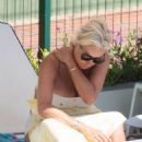 Denise Van Outen – In a bikini at a tennis club pool in Marbella - 454 x 682