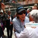 L'Wren Scott and Mick Jagger on the grid ahead of the Monaco F1 race, May 16, 2010 in Monte Carlo, Monaco - 454 x 303
