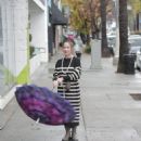 Claudia Wells – Shopping in the rain in Studio City - 454 x 681