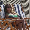 Cristina Marino in Green Bikini on the beach in Miami - 454 x 635