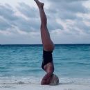 Ilary Blasi in Swimsuit – Doing yoga at the Maldives - 454 x 605