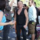 Joe Elliott, Phil Collen and Vivian Campbell of Def Leppard appear for a performance and interview with Mario Lopez of 'Extra' at The Grove, California on June 1st, 2012 - 432 x 594