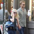 A smitten looking Dakota Fanning and her boyfriend Jamie Strachan go hand in hand for a stroll around New York City - 347 x 594