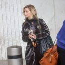 Jenna Coleman – In a chocolate leather coat seen with Aidan Turner in London - 454 x 644