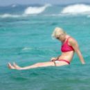 Lindsey Vonn – In a red bikini paddle board in Tulum