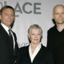 Press conference on the set of Quantum of Solace at Pinewood Studio. Left to right: Daniel Craig, Judi Dench, Director Marc Forster. Byline David Dettmann. Quantum of Solace © 2008 Danjaq, LLC, United Artists Corporation, Columbia Pictures Industries, Inc - 454 x 303
