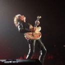 Joe Perry performing with Aerosmith in Grand Rapids, Michigan on August 4, 2015 - 454 x 340