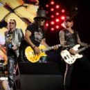 Axl Rose Empathizes, Apologizes in New Guns N’ Roses Song ‘Perhaps’