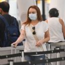 Lindsay Lohan &#8211; With husband Bader Shammas seen at JFK Airport in New York