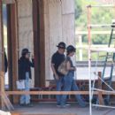 Milla Jovovich – With Paul W.S. Anderson inspecting a under-construction home in Brentwood