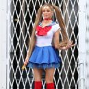 Olivia Attwood – On set of ‘Getting Filthy Rich’ at Comic Con at Olympia in London - 454 x 681