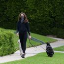 Troian Bellisario – Out for a walk with her dog in Los Angeles - 454 x 459