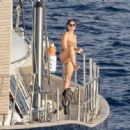 Katy Perry – In a brown strapless swimsuit enjoying a holiday in Nerano