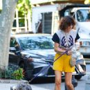 Helena Christensen – Steps out with her dog in New York