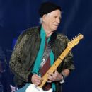 Keith Richards performs during a stop of the band's No Filter tour at Allegiant Stadium on November 6, 2021 in Las Vegas, Nevada - 454 x 682