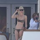 Claudia Schiffer in Animal Print Bikini on a yacht in Portofino