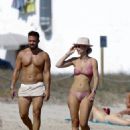 Vogue Williams – Spotted in a pink bikini on the Ibiza beach - 454 x 585