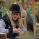 Alice Eve – Stopping for a chocolate croissant in London - 454 x 303