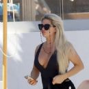 Bianca Gascoigne – Seen in a black swimsuit at Ibiza’s Cala de Bou beach - 454 x 592