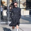 Sofia Carson in silver boots in New York