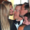 Someone's in the mood for celebrating! Leonardo DiCaprio was seen kissing girlfriend Toni Garrn at the CAA Golden Globes after party on Sunday night