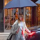 Laura Dern – Seen with umbrellas in Central London
