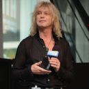 Rick Savage performs during 
