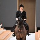 Charlotte Casiraghi, Monégasque princess and granddaughter of actress Grace Kelly, opened the Chanel Spring/Summer 2022 Haute Couture show on her horse, Kuskus, at the Grand Palais on January 25, 2022 - 454 x 681
