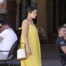 Selena Gomez in Long Yellow Dress – Arrives on a helicopter in Civita di Bagnoregio
