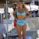 Sophie Monk in Blue Bikini on a beach in Portofino