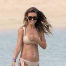 Audrina Patridge &#8211; In bikini at the beach in Hawaii