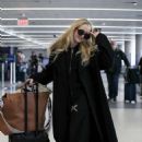Kathryn Newton – Catches a flight at LAX in Los Angeles - 454 x 681
