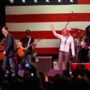 Musician Kid Rock performs during a campaign rally for Republican presidential candidate and former Massachusetts Gov. Mitt Romney at the Royal Oak Theatre on February 27, 2012 in Royal Oak, Michigan. Michigan residents will go to the polls on February 28