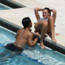 Oriana Sabatini in Bikini at the pool in Miami - 454 x 332