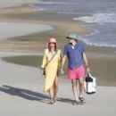 Paulina Porizkova – With boyfriend Jeff Greenstein seen on a Caribbean beach in St Barts - 454 x 303