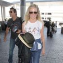 Kim Basinger in Jeans at LAX airport in Los Angeles