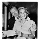 JUL 30 1956, 8/1/1956 Things are Different Now - Actress Nancy Valentine and Ted Tillinghast, a Beverly Hills stock broker, were a happy prospective bride and groom (above) as they took out a marriage license here last week, but today she says the wedding