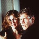Harrison Ford and Margaret Colin