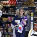 Danielle Lloyd – Seen picking up handfuls of Easter Eggs with her friend at Tesco Birmingham - 454 x 743
