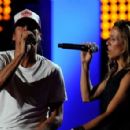 Singers Kid Rock and Sheryl Crow perform onstage during Day 1 of rehearsals for the 2011 CMT Music Awards at Bridgestone Arena on June 7, 2011 in Nashville, Tennessee