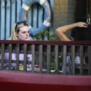 Elle Fanning – Is having a great time with her friends in Los Angeles - 454 x 347