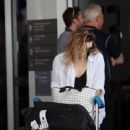 Katherine Langford – Seen at Perth Airport - 454 x 510