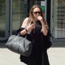 Rita Simons – Arrive at the Slough Ice Arena for practice - 454 x 702