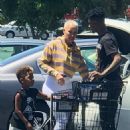 Amber Rose, 21 Savage, and Sebastian at a Grocery Store in Los Angeles, California - July 2, 2017