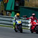 Valentino Rossi (L) of Italy and Fiat Yamaha Team congratulates with Nicky Hayden of USA and Ducati Marlboro Team (his teammate for the season 2011) after the MotoGP race during the Czech Grand Prix at Brno Circuit on August 15, 2010 in Brno, Czech Republ