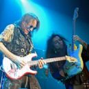 Yngwie Malmsteen performs during the Generation Axe show at The Joint inside the Hard Rock Hotel & Casino on November 9, 2018 in Las Vegas, Nevada - 454 x 332