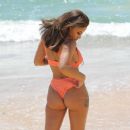Kayleigh Morris – In orange bikini on the beach in Cyprus - 454 x 389